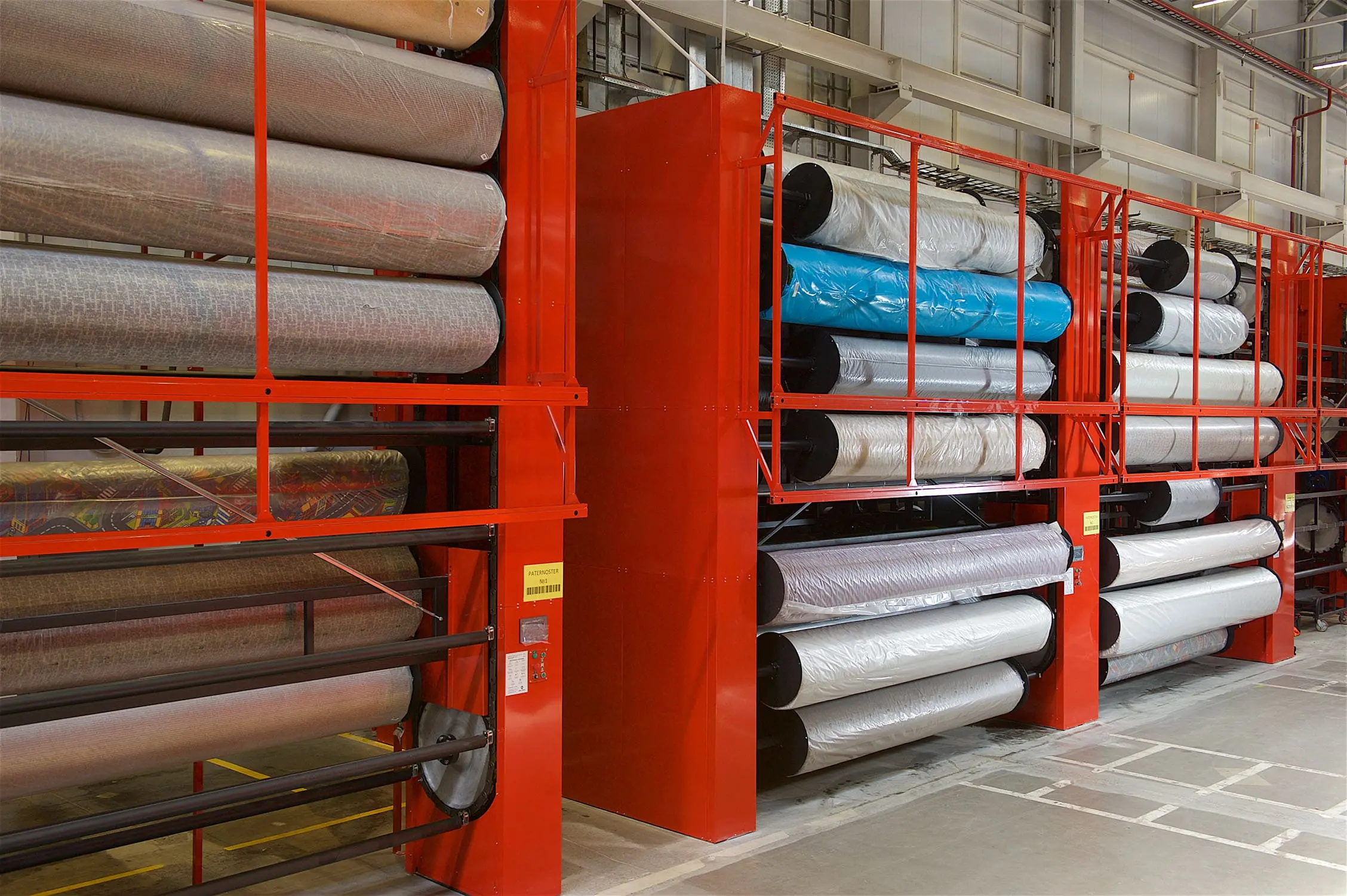 Vertical storage carousels systems for rolls